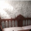 Proyección cemento paredes casa cueva