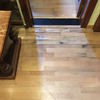 Pulir parquet y arreglar desperfecto por agua