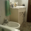 Reforma de baño integral con cambio de ubicación de inodoro y ducha