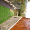 Mantenimiento y pintura del exterior de una casa de madera