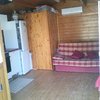 Desmontar, transportar y volver a montar casa de madera pequeña
