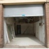 Cerramiento aluminio y cristal con puerta grande