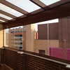 Instalación cerramiento de ático con cortinas de cristal (sin perfiles)