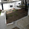 Ampliar Vivienda Unifamiliar Cogiendo Parte del Patio