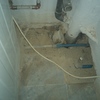 Arreglo suelo cuarto de baño y galeria