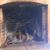 Instalar puerta de cristal en chimenea