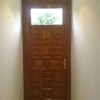 Cambiar puerta del portal de madera por una de aluminio