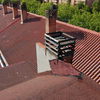 Colocar extractor humos en chimenea salida shunt cocinas/baños por tejado de edificio de 36 viviendas