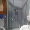 Arreglar mampara baño puerta rota