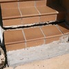 Reconstrucción dos peldaños y base de escalera exterior