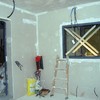 Tabique con Puerta Corredera y Ventana