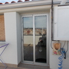 Instalacion de 2 persianas: una en puerta y otra en ventana pequeña