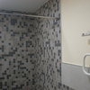 Reparación pared cuarto de baño y suelo