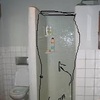 Poner puerta ducha