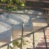 Colocación de unos 5 metros de canalón y 10 de vierteaguas y reparación de escalera exterior