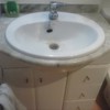 Instalar mueble de baño con loza y grifería