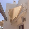 Instalacion de un toldo en una terraza