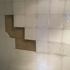 Reparacion pared azulejos baño