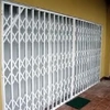 Suministrar Puerta de Cochera y Reja de Aluminio