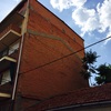 Proyectado fachada lateral de edificio