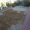 Colocar cemento en zona de jardín en el suelo
