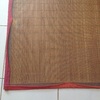 Coser borde en alfombra de bambu