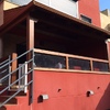 Pintar pérgola de madera de unifamiliar