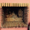 Instalación de una puerta para chimenea