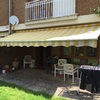 Reparar toldo sujeto a pared
