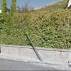Cercado de parcela con muro y valla metálica además de puerta de garaje y de peatones
