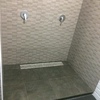 Panel separador para hueco de dos duchas
