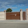 Puerta de garage y puerta de paso de una parcela
