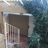 Reparación humedad y colocación de puerta exterior con remate en pared y condenar otra puerta