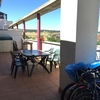 Cerramiento de terraza con cortina de cristal