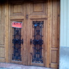 Reparación cerrajeria y puesta a punto de puerta madera, dos hojas y exterior