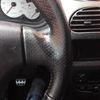 Tapizar el volante de un peugeot 206