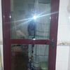 Sustituir una puerta de tendedero de aluminio lacado rojo