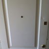 Reparar golpe en frontal de puerta acorazada