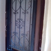 Puerta exterior vivienda forja