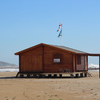 Pintar caseta de madera en la playa
