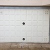 Sustituir puerta de garaje averiada