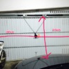 Reparar brazo roto puerta garaje