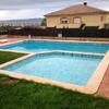 Reforma en piscina de comunidad de vecinos y en parcelas de chalets contiguos para resolver problemas de filtración de piscina en semisótanos