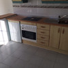 Reforma cocina armario y baño en cemento pulido