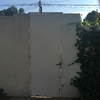Cambiar puerta jardin a la calle, metalica
