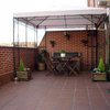 Suelo bajo Pérgola de Madera Atico