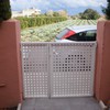 Instalar puerta de aluminio lacada blanca