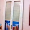 Cambiar ventanas (y una puerta) de madera por alumninio blanco