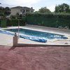 Reforma piedra de piscina con hormigon
