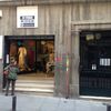 Poner un cartel sobre local comercial y quitar el existente